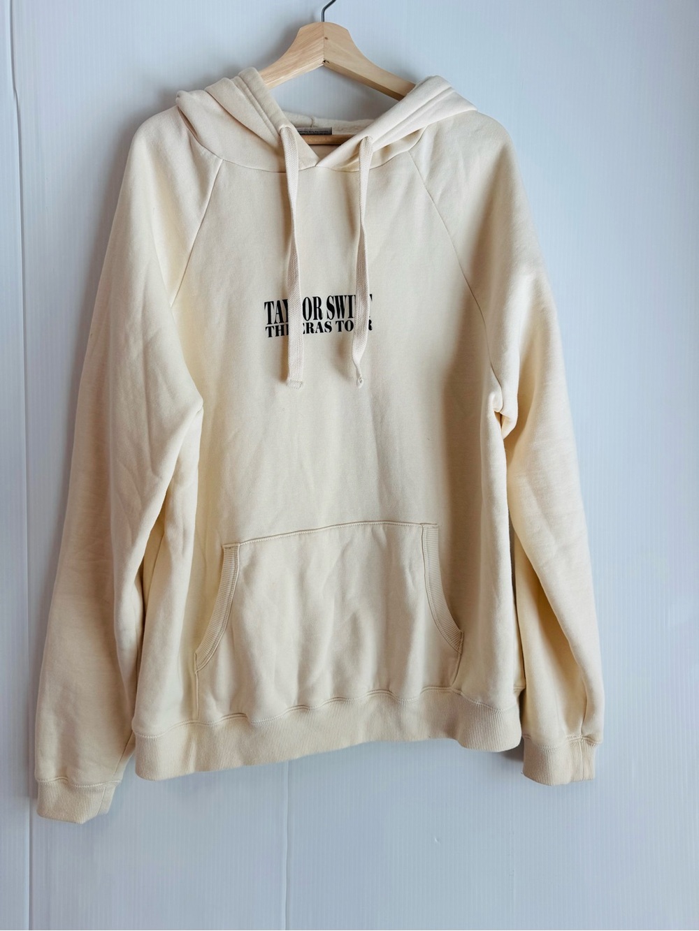 Taylor Swift Eras Tour Cream Pullover Hoodie with Black Logo